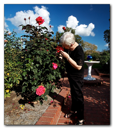 Sandra Smelling the Roses